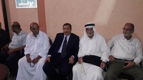 [[[640,123,63,86,755,425],"أ. محمد علي البطه"],[[446,122,59,86,755,425],"أ. بهاء الدين البطه"],[[324,111,58,86,755,425],"المختار د. فوزي البطه"],[[146,106,70,99,755,425],"محمد ابراهيم البطه"]]